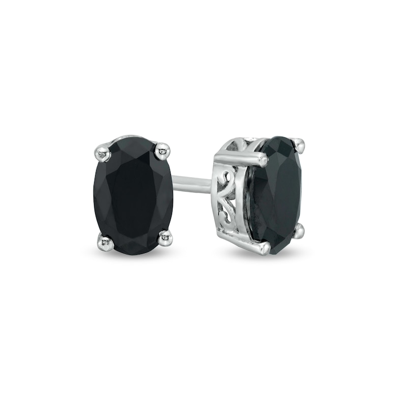 Main Image 1 of 0.95 CT. T.W. Oval Black Enhanced Diamond Solitaire Stud Earrings in 10K White Gold