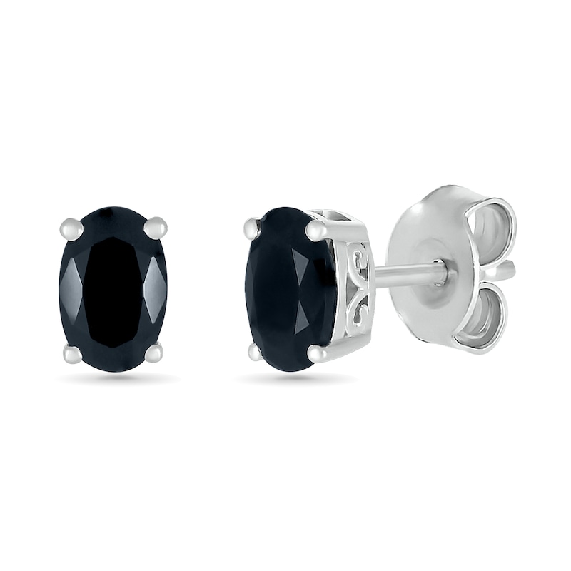 Main Image 2 of 0.95 CT. T.W. Oval Black Enhanced Diamond Solitaire Stud Earrings in 10K White Gold