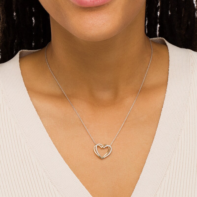 Main Image 2 of 0.117 CT. T.W. Diamond Interlocking Hearts Necklace in Sterling Silver and 10K Gold