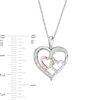 0.145 CT. T.W. Diamond Interlocking Heart Trio Pendant in Sterling Silver and 10K Rose Gold