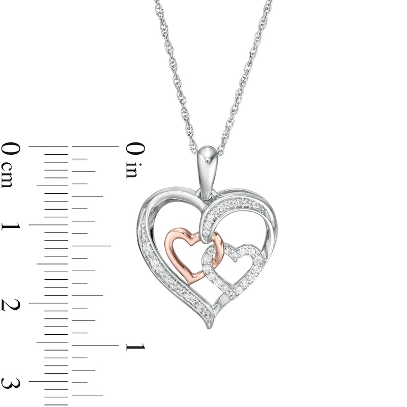 0.145 CT. T.W. Diamond Interlocking Heart Trio Pendant in Sterling Silver and 10K Rose Gold