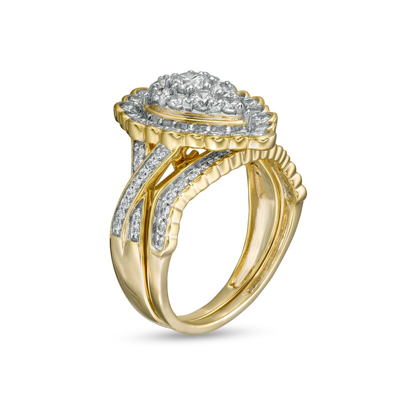 1.37 CT. T.W. Composite Pear-Shaped Diamond Frame Scallop Edge Bridal Set in 10K Gold