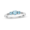 Swiss Blue Topaz and Diamond Accent Three Stone Ring in 10K White Gold