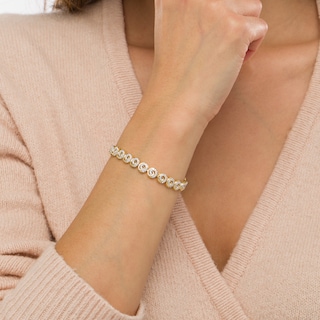 2.01 CT. T.W. Diamond Swirl Bracelet in 10K Gold – 7.25"