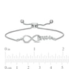 0.065 CT. T.W. Diamond Infinity Loop "MOM" with Heart Bolo Bracelet in Sterling Silver – 9.5"