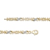 0.04 CT. T.W. Diamond "MOM" Infinity Loop Bracelet in Sterling Silver with 14K Gold Plate – 7.5"