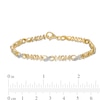 0.04 CT. T.W. Diamond "MOM" Infinity Loop Bracelet in Sterling Silver with 14K Gold Plate – 7.5"