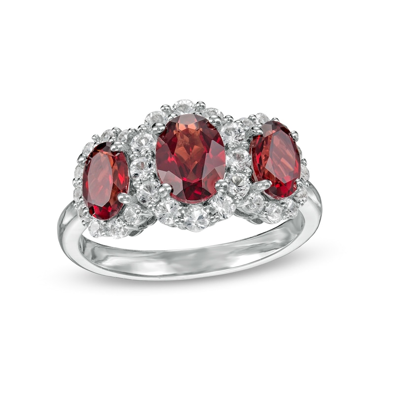 Oval Garnet and White Lab-Created Sapphire Frame Three Stone Ring in Sterling Silver