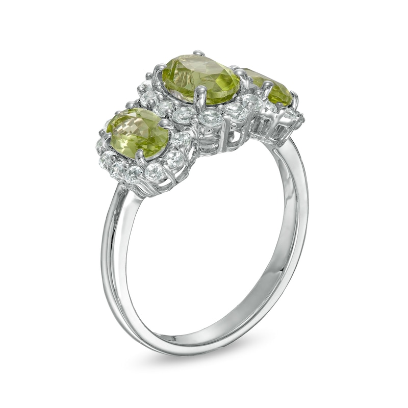 Main Image 3 of Oval Peridot and White Lab-Created Sapphire Frame Three Stone Ring in Sterling Silver