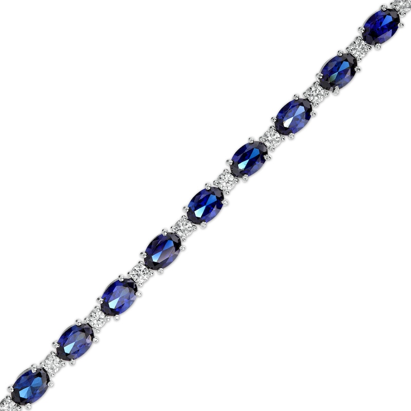 Main Image 1 of Oval Blue and White Lab-Created Sapphire Alternating Line Bracelet in Sterling Silver - 7.25"