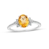 Thumbnail Image 0 of Oval Citrine and 0.086 CT. T.W. Diamond Leaf-Sides Floral Ring in 10K White Gold