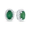 Thumbnail Image 1 of Oval Emerald and 0.10 CT. T.W. Diamond Frame Stud Earrings in 14K White Gold