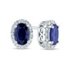 Thumbnail Image 1 of Oval Blue Sapphire and 0.10 CT. T.W. Diamond Frame Stud Earrings in 14K White Gold
