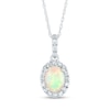 Oval Opal and 0.12 CT. T.W. Diamond Frame Drop Pendant in 14K Gold
