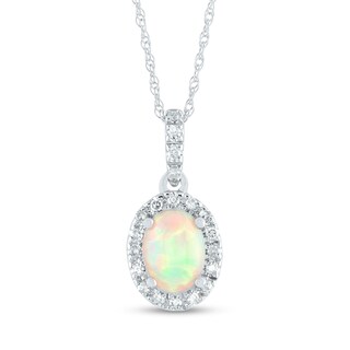 Oval Opal and 0.12 CT. T.W. Diamond Frame Drop Pendant in 14K Gold