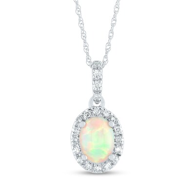 Oval Opal and 0.12 CT. T.W. Diamond Frame Drop Pendant in 14K Gold