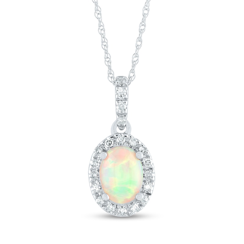 Oval Opal and 0.12 CT. T.W. Diamond Frame Drop Pendant in 14K Gold