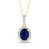 Thumbnail Image 1 of Oval Blue Sapphire and 0.12 CT. T.W. Diamond Frame Drop Pendant in 14K Gold