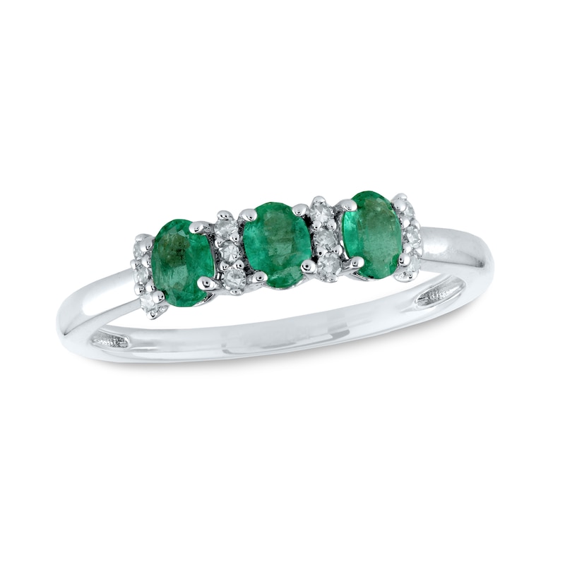 Oval Emerald and 0.08 CT. T.W. Diamond Three Stone Ring in 14K Gold