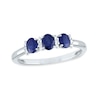 Thumbnail Image 0 of Oval Blue Sapphire and 0.08 CT. T.W. Diamond Three Stone Ring in 14K White Gold