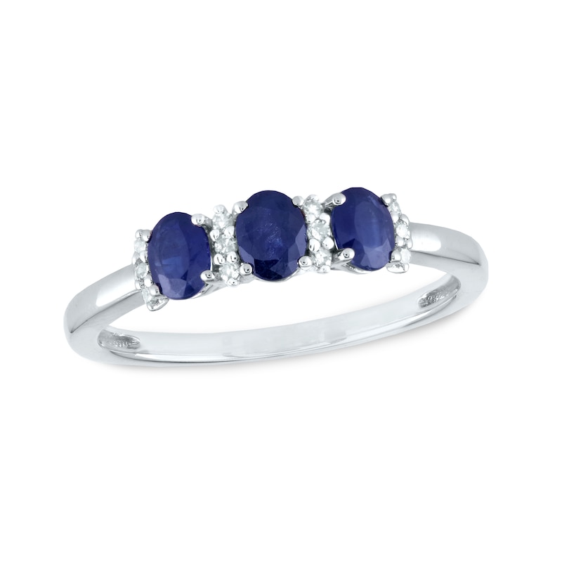 Oval Blue Sapphire and 0.08 CT. T.W. Diamond Three Stone Ring in 14K White Gold