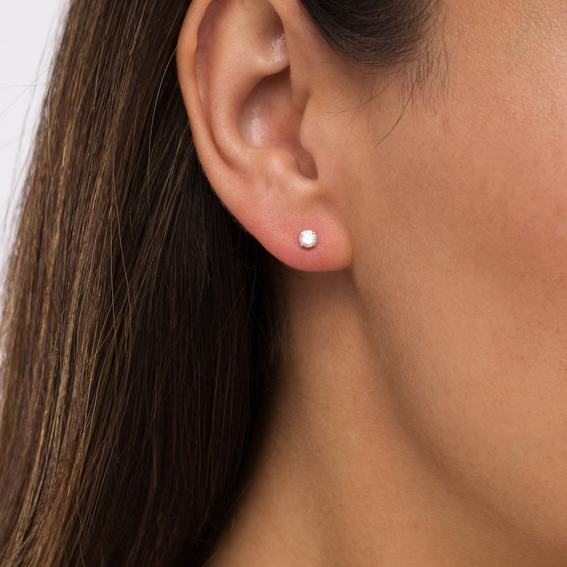 Main Image 2 of 0.20 CT. T.W. Diamond Solitaire Stud Earrings in 10K Gold