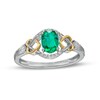 Thumbnail Image 1 of Oval Lab-Created Emerald and 0.04 CT. T.W. Diamond Frame Intertwined Frame Ring in Sterling Silver and 10K Gold