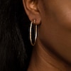 50.0mm Diamond-Cut Inside-Out Tube Oval Hoop Earrings in 14K Gold