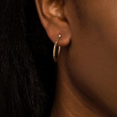 26.06mm Diamond-Cut Knife Edge Tube Oval Hoop Earrings in 10K Gold