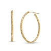 Thumbnail Image 0 of 30.0mm Diamond-Cut Inside-Out Tube Oval Hoop Earrings in Hollow 10K Gold