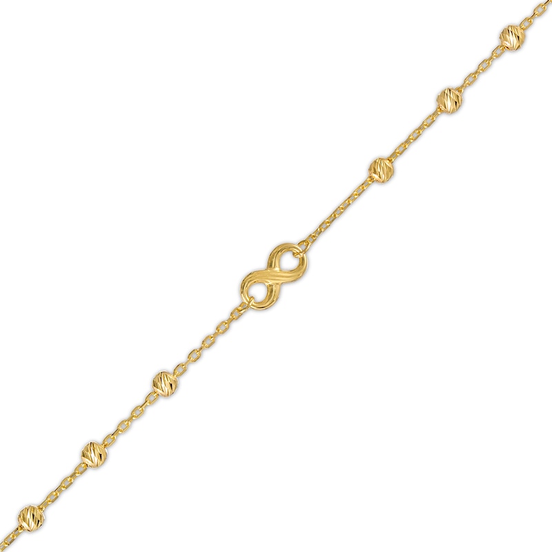 Main Image 1 of Diamond-Cut Infinity and Brilliance Bead Station Bracelet in 10K Gold - 7.5"