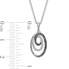 0.16 CT. T.W. Black Enhanced and White Diamond Oval Spiral Pendant in Sterling Silver