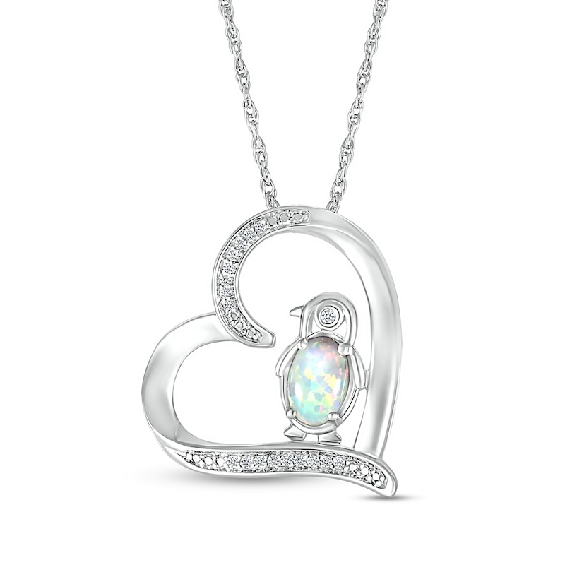 Oval Lab-Created Opal and 0.04 CT. T.W. Diamond Penguin in Tilted Heart Outline Pendant in Sterling Silver