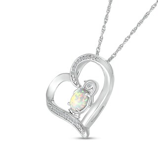 Oval Lab-Created Opal and 0.04 CT. T.W. Diamond Penguin in Tilted Heart Outline Pendant in Sterling Silver