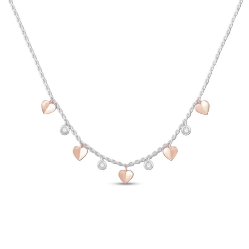 0.18 CT. T.W. Diamond Alternating Heart Station Pendant in Sterling Silver and 10K Rose Gold – 19"