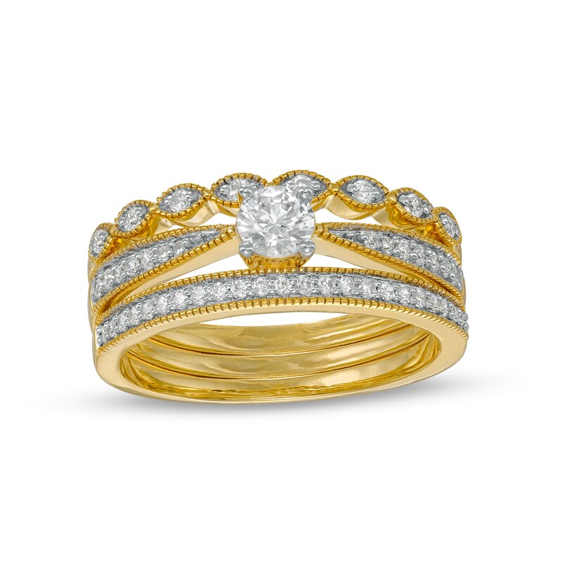 0.45 CT. T.W. Diamond Vintage-Style Three Piece Bridal Set in 10K Gold (J/I3)