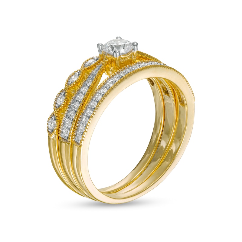 0.45 CT. T.W. Diamond Vintage-Style Three Piece Bridal Set in 10K Gold (J/I3)