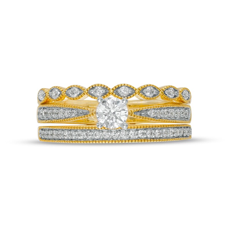 0.45 CT. T.W. Diamond Vintage-Style Three Piece Bridal Set in 10K Gold (J/I3)