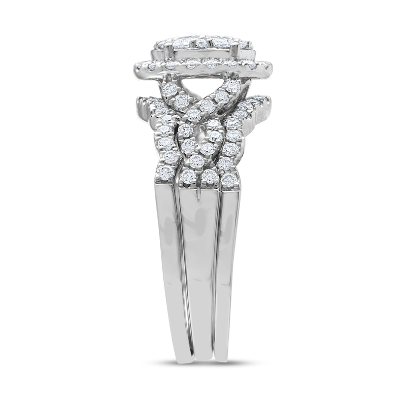 1.37 CT. T.W. Composite Oval Diamond Three Piece Twist Shank Bridal Set in 14K White Gold