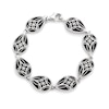Thumbnail Image 1 of Sideways Pear-Shaped Black Onyx with Diamond-Cut Beaded Cross Overlay Vintage-Style Line Bracelet in Sterling Silver