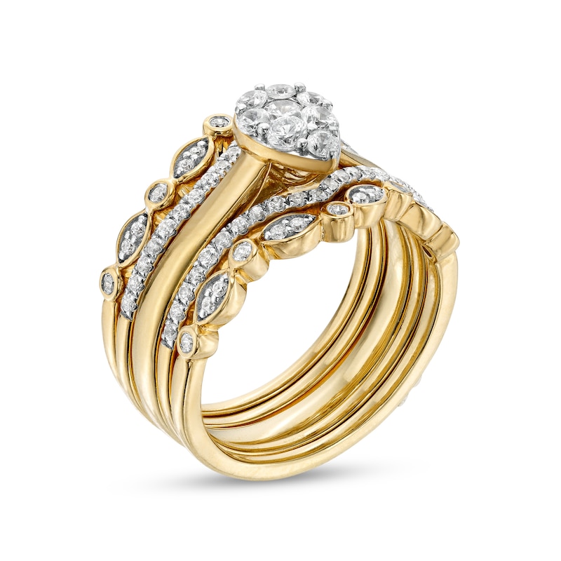 0.33 CT. T.W. Composite Pear-Shaped Diamond Contour Five Piece Bridal Set in 10K Gold