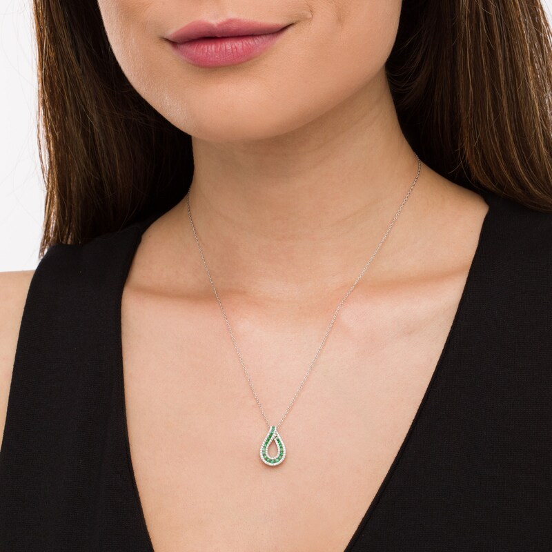 Emerald and 0.20 CT. T.W. Diamond Border Graduated Triple Row Loop Teardrop Pendant in 14K White Gold