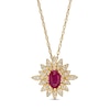 Oval Ruby and 0.20 CT. T.W. Diamond Starburst Pendant in 14K Gold