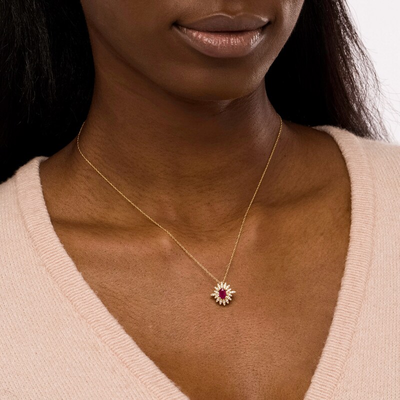 Main Image 2 of Oval Ruby and 0.20 CT. T.W. Diamond Starburst Pendant in 14K Gold