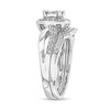 0.56 CT. T.W. Princess-Cut Quad Diamond Frame Twist Shank Bridal Set in 10K White Gold