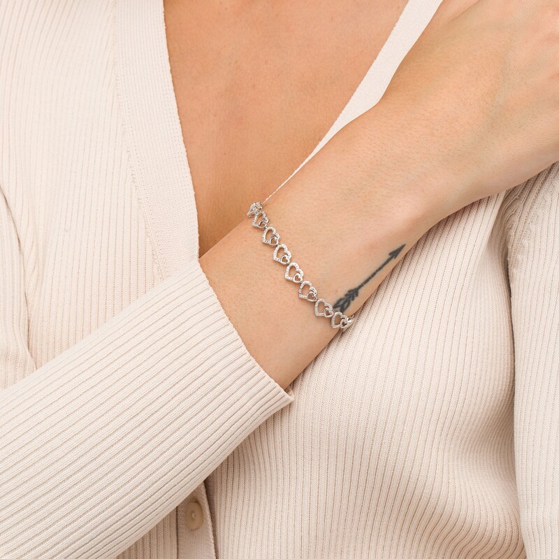 Main Image 2 of 0.25 CT. T.W. Diamond Hearts Line Bracelet in Sterling Silver - 7.5"