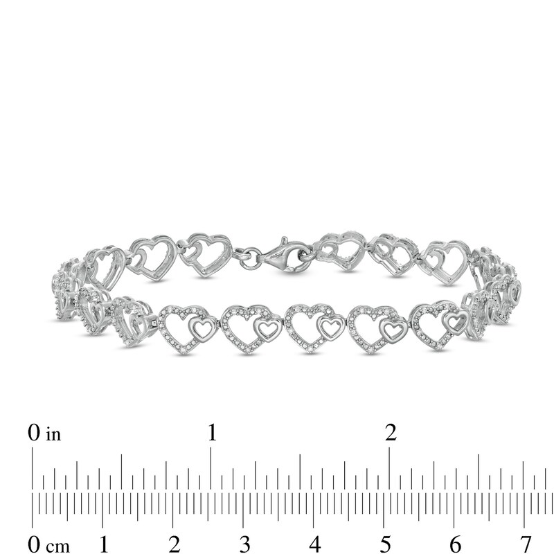 Main Image 4 of 0.25 CT. T.W. Diamond Hearts Line Bracelet in Sterling Silver - 7.5"