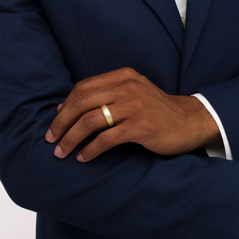 0.33 CT. T.W. Diamond Three Stone Wedding Band in 10K Gold