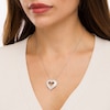 Thumbnail Image 1 of 1.00 CT. T.W. Diamond Triple Row Heart Pendant in Sterling Silver