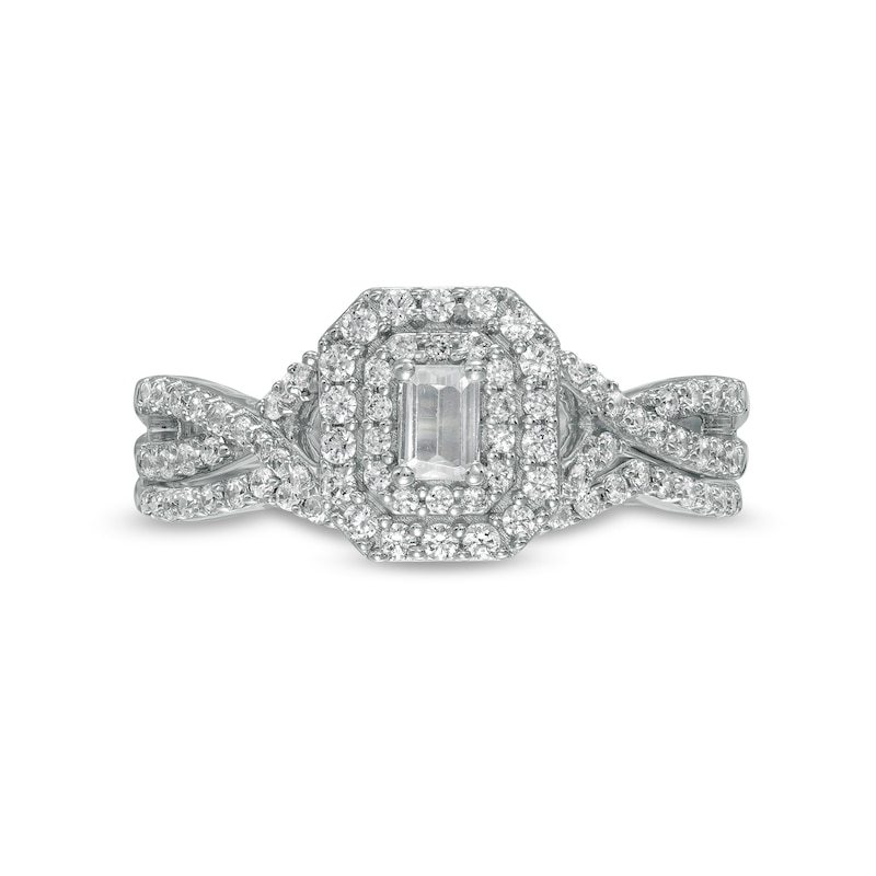 0.58 CT. T.W. Emerald-Cut Diamond Double Frame Twist Shank Bridal Set in 10K White Gold (I/I2)